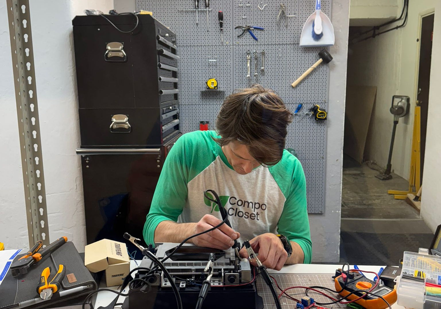 Richard Peter, CEO of CompoCloset, working on the prototype of the S1 Sealing toilet